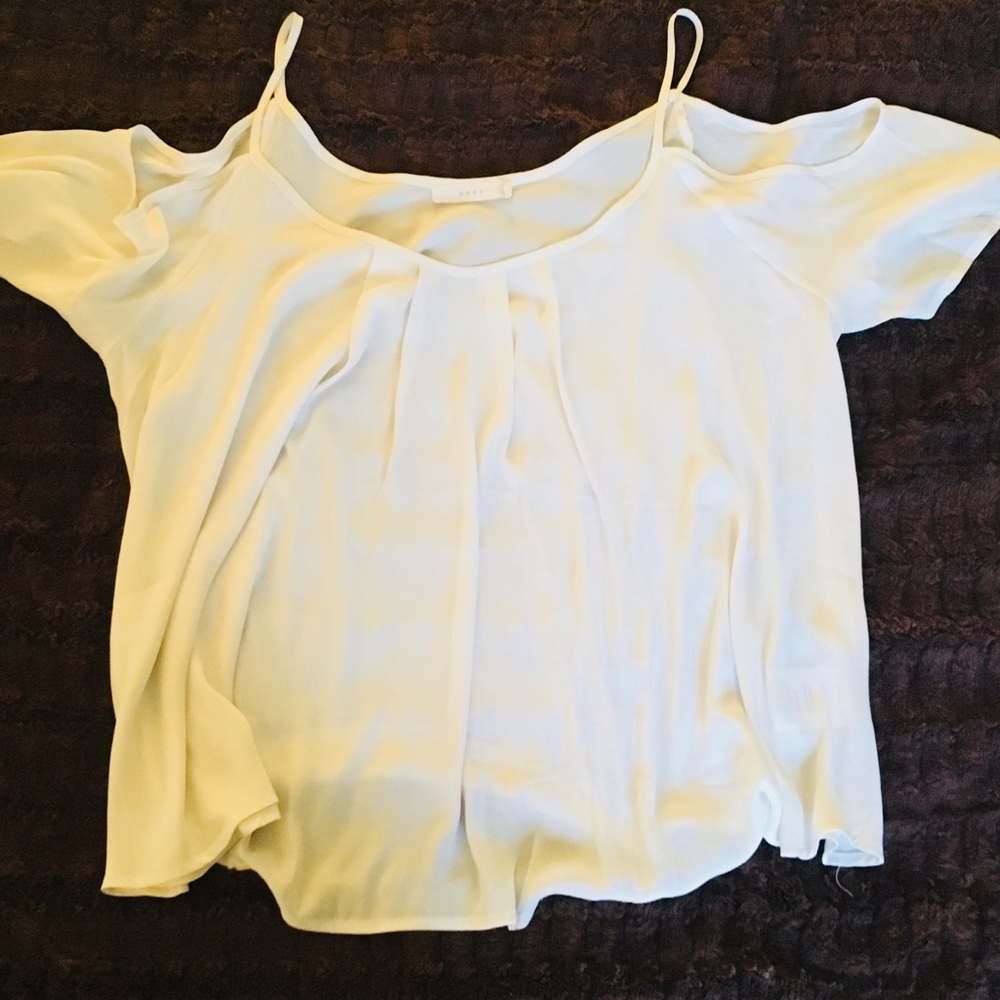 Sheer white shirt with shoulder cut outs